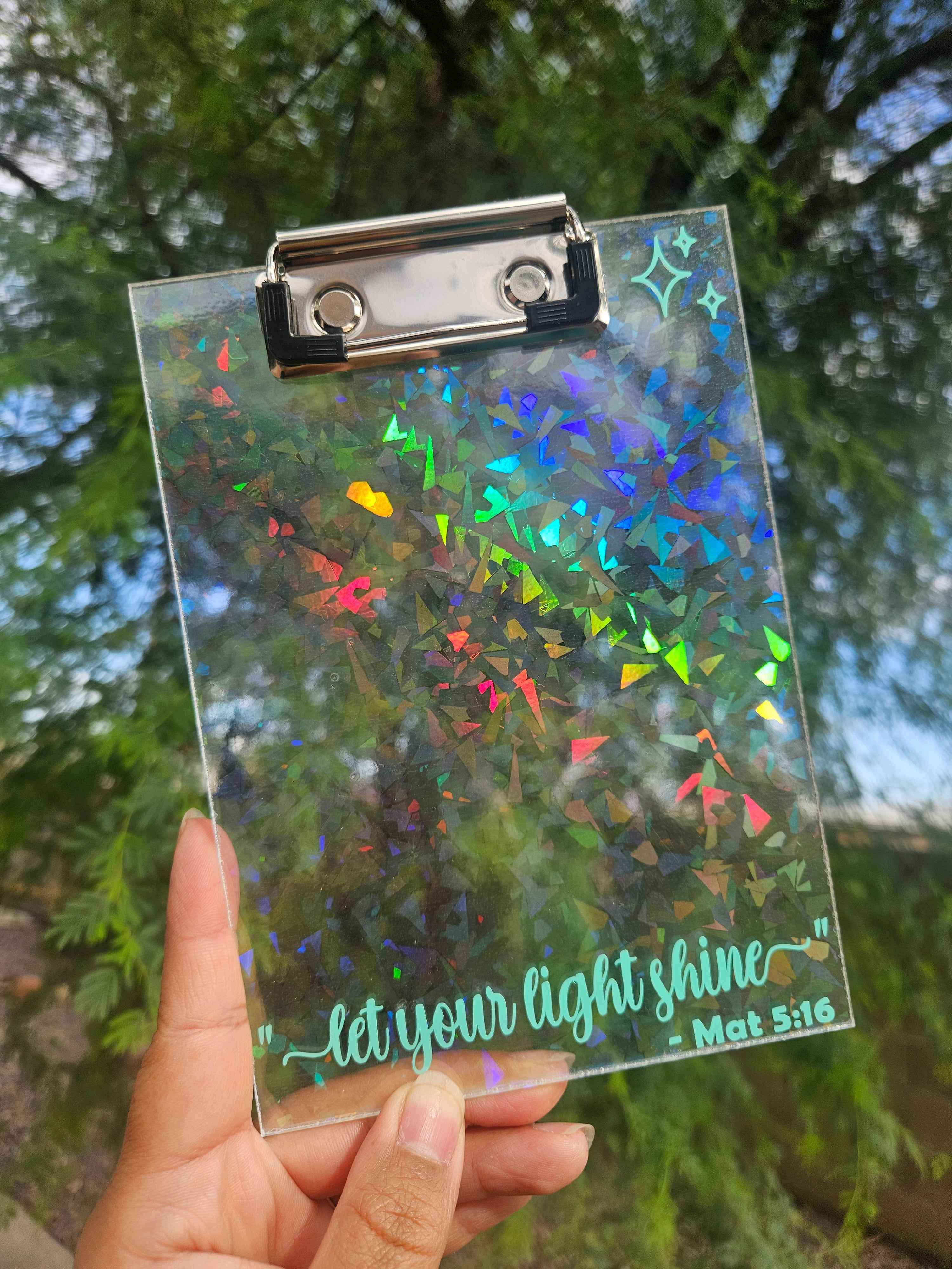 Handmade 5x7 acrylic clipboard with Matthew 5:16 “Let Your Light Shine” vinyl design, ideal for Jehovah’s Witness ministry, preaching notes, personal journaling, and inspirational gift.