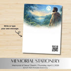 Memorial stationery with a painting of a man by a lake under a moonlit sky, on a wooden surface.
