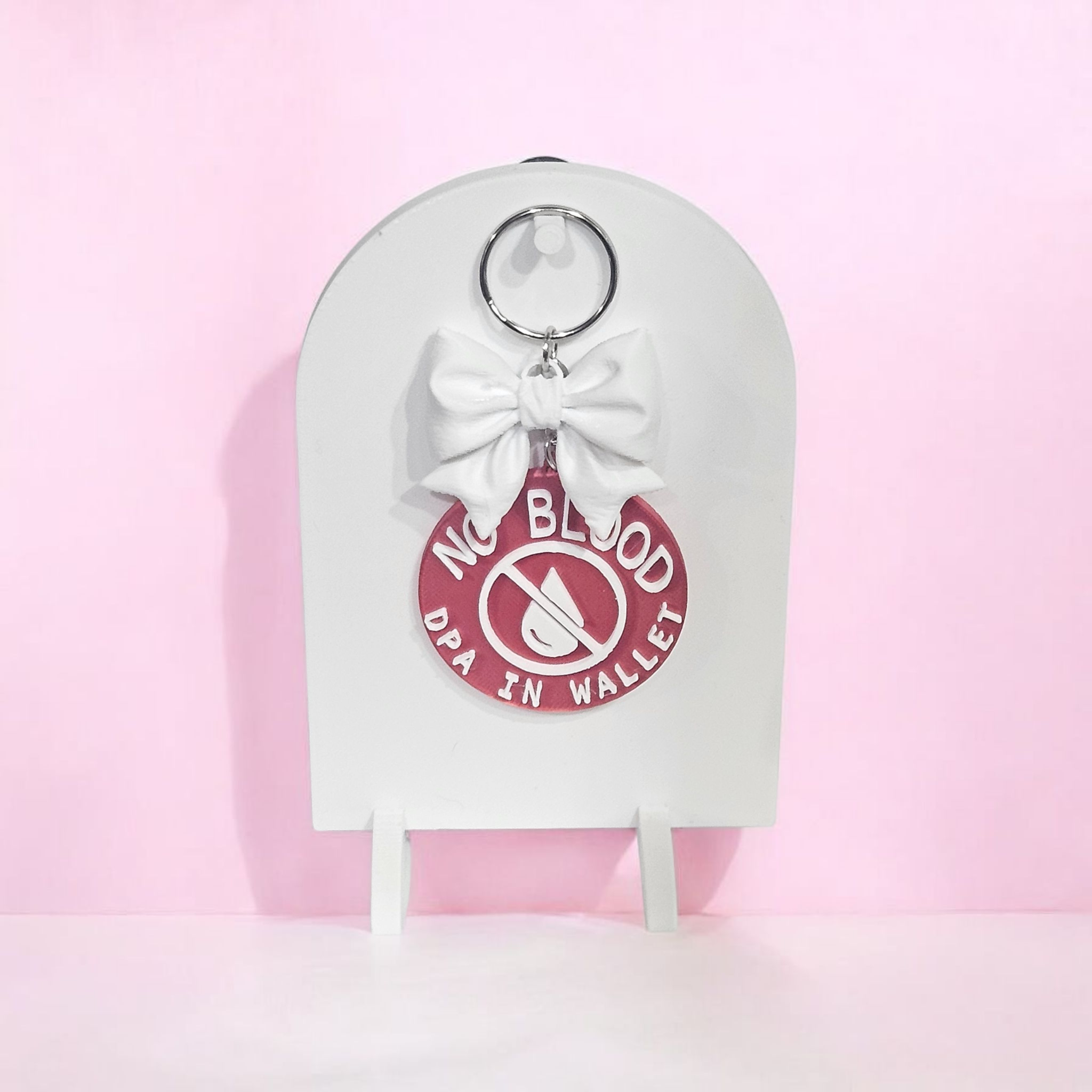 Red “No Blood – DPA in Wallet” 3D printed keychain with bow, silk finish, lightweight and durable medical ID accessory for JW ministry and everyday use