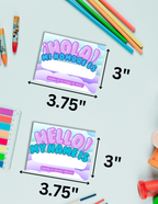XL printable kids name tag PDF with Clouds design dimensions labeled on a light blue background with colorful markers.